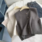Sleeveless Knit Vest With Single Row Button Closure