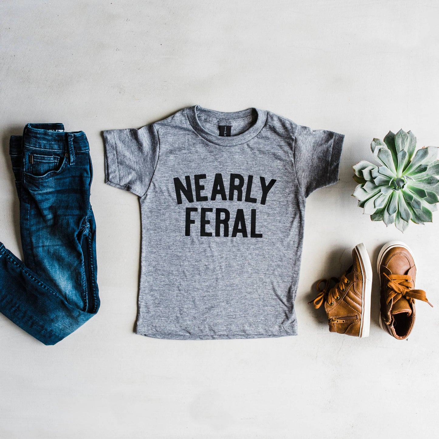 Nearly Feral Kids Tee
• Gray